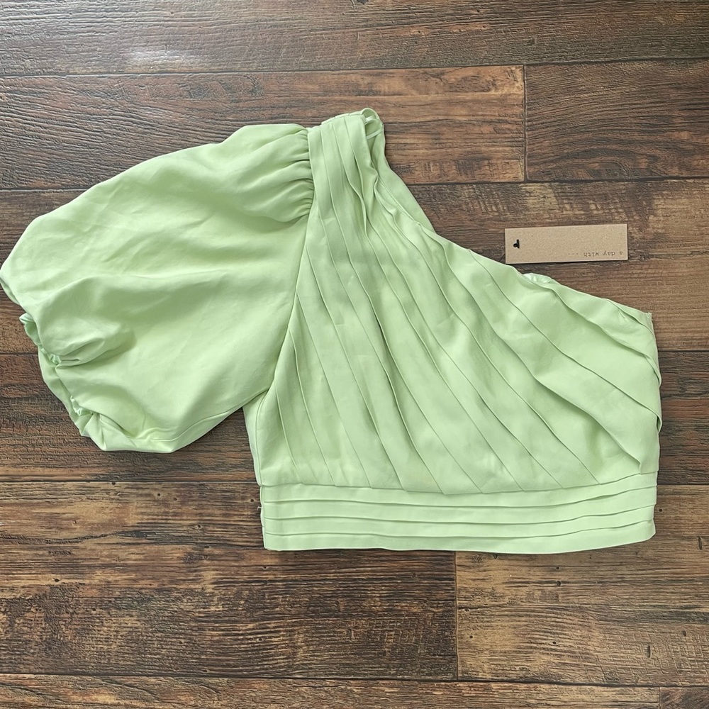 NWT. DO+BE one sleeve crop top blouse dress shirt. Light green shirt. Size M.
